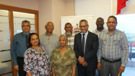 Minister of Agriculture, Land and Fisheries, Senator the Honourable Clarence Rambharat (third from right) is flanked by farmers following a ceremony held on Friday 28th September, 2018, to distribute letters to farmers, conveying Cabinet approval for standard agricultural leases. The ceremony took place at the Chaguanas corporate headquarters of the Ministry of Agriculture, Land and Fisheries (MALF).